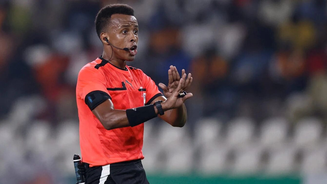 Somali referee Omar Abdulkadir Artan gestures during Africa Cup of Nations match in Bouake, Ivory Coast, 23 January 2024 (Kenzo Tribouillard/AFP)