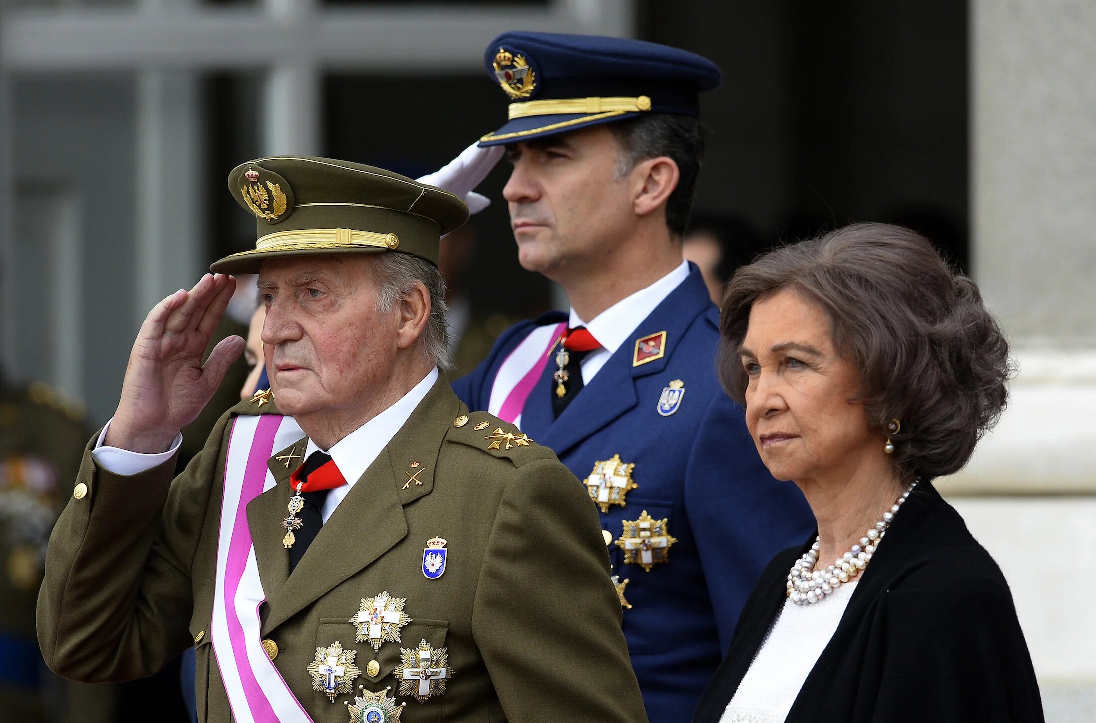 Spain's king Juan Carlos with his son and wife