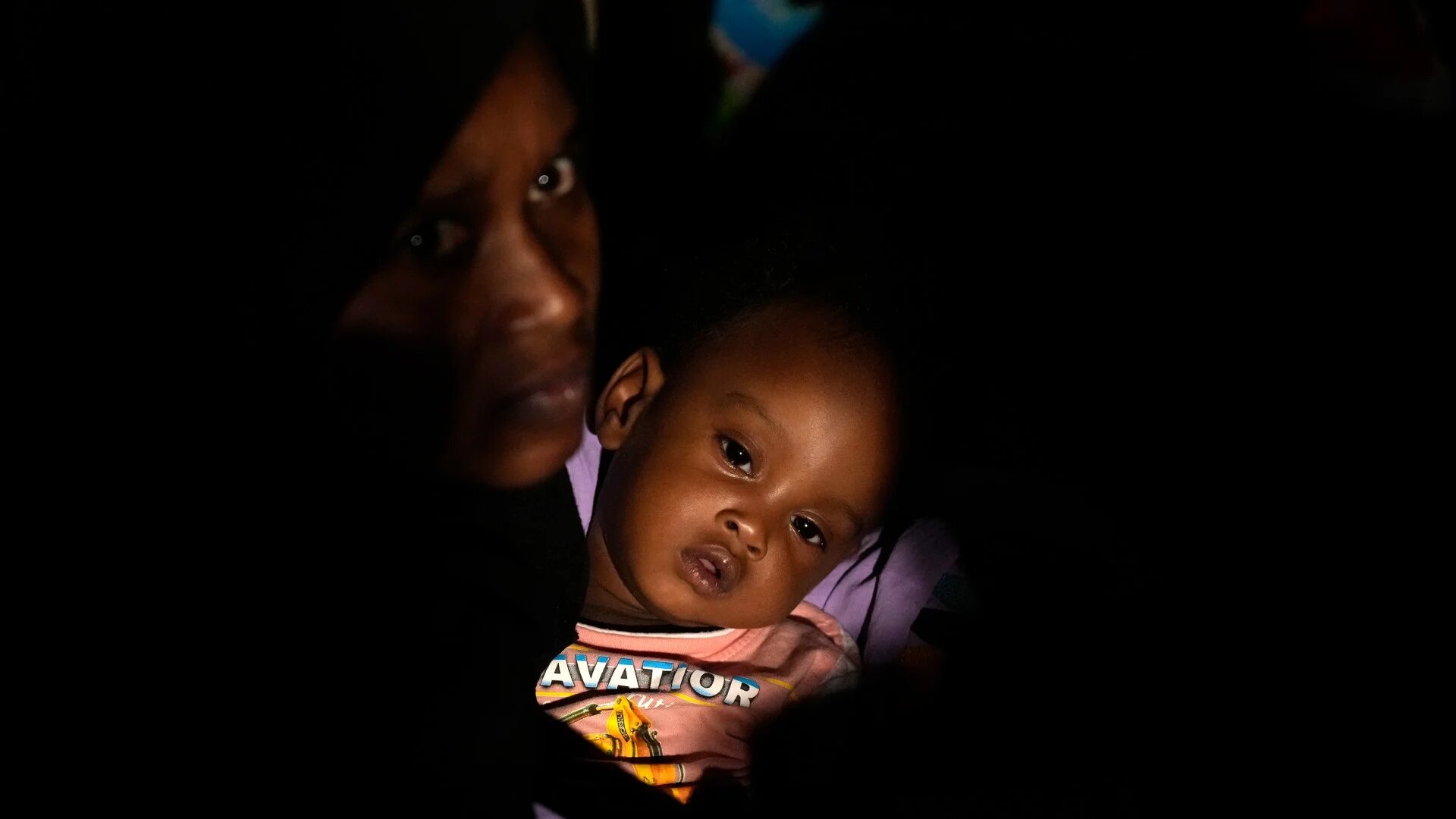 Sudanese evacuees wait before boarding a Saudi military ship to Jeddah, at Port Sudan, 2 May (AP/Amr Nabil)