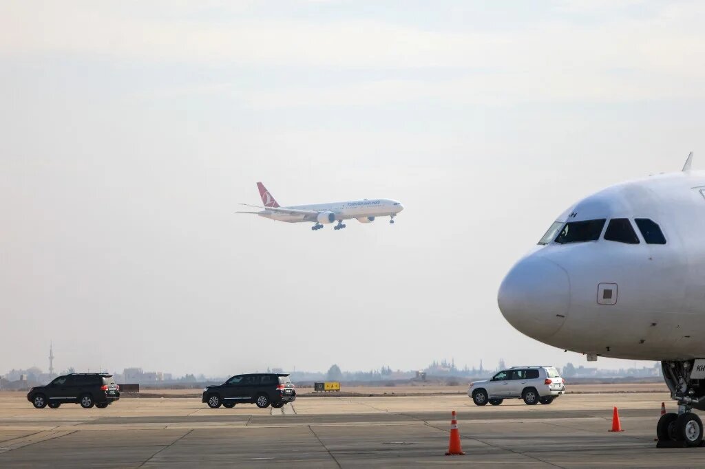 A Turkish Airlines aircraft carrying a diplomatic delegation from Ankara and an aid shipment provided by the Turkish Red Crescent, lands at the Damascus International Airport in the Syrian capital on January 23, 2025. (Bakr ALKASEM / AFP)
