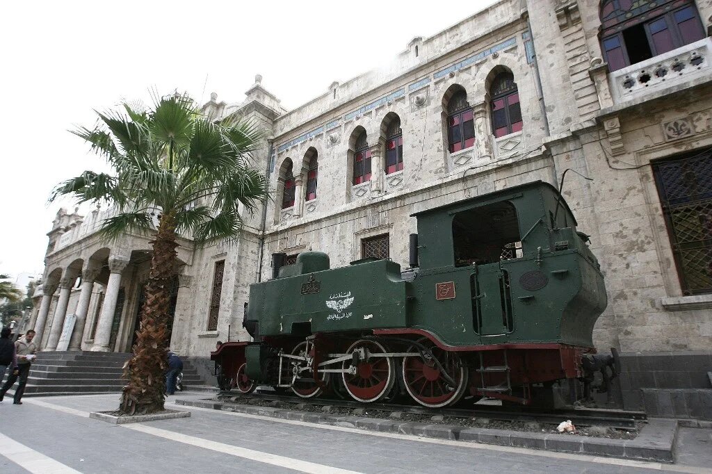 An old locomotive sits outside the Hejaz rail station in old Damascus on February 23, 2010. The Hejaz railway ran from Damascucs to Medina in Saudi Arabia and was part of the Ottoman railway network. (Louai Beshara / AFP)