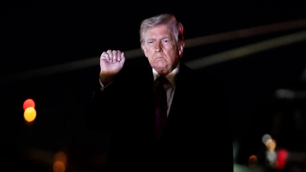  President Donald Trump exits Air Force One at Joint Base Andrews, Maryland on 29 March 2026 (Nathan Howard/Getty Images/AFP)