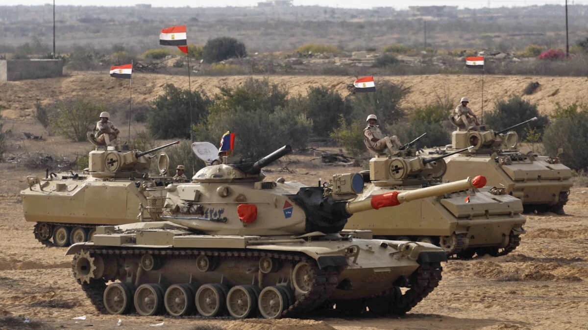 Egyptian tanks are deployed near the Rafah crossing with Gaza, on 31 October 2023 (AFP)