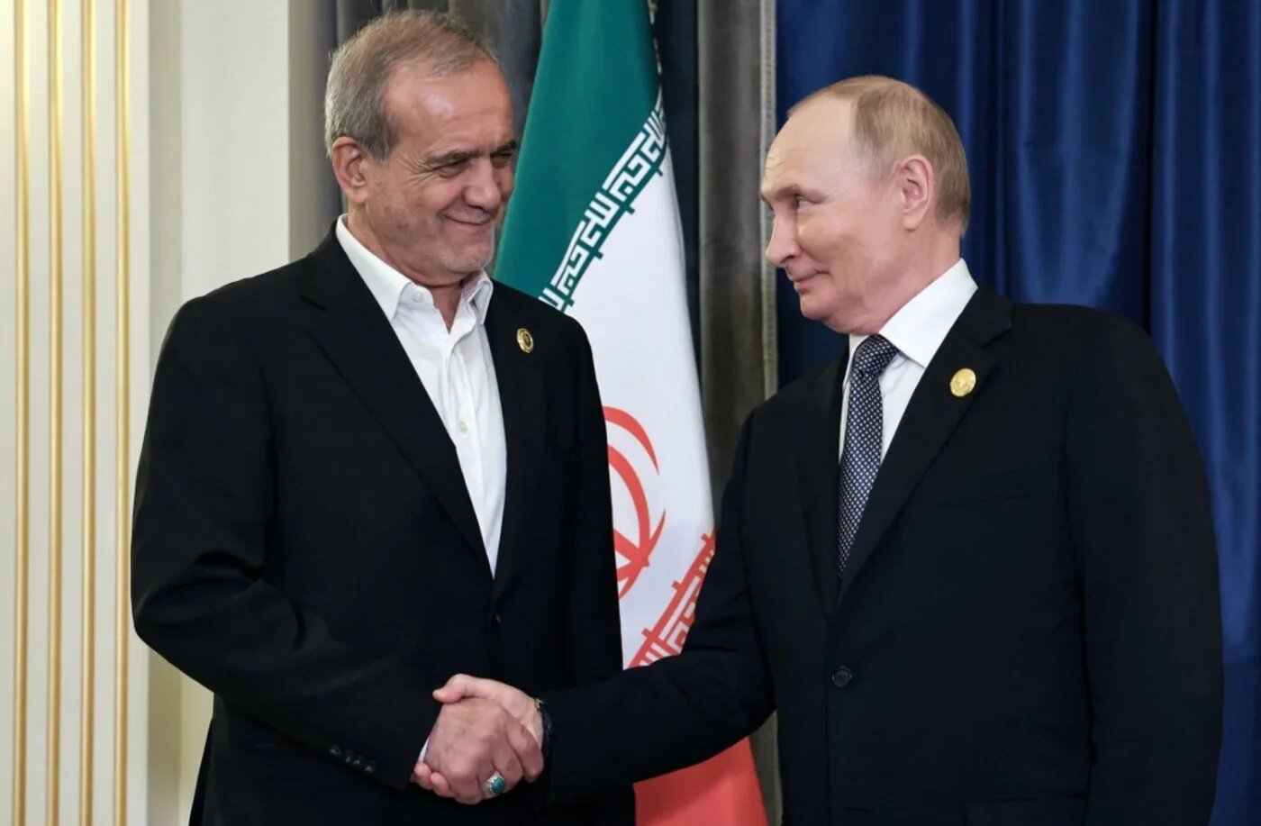 Russia's President Vladimir Putin with Iranian counterpart Masoud Pezeshkian at the Shanghai Cooperation Organisation Summit in Tianjin on 1 September 2025 (Alexander Kazakov/pool/AFP)