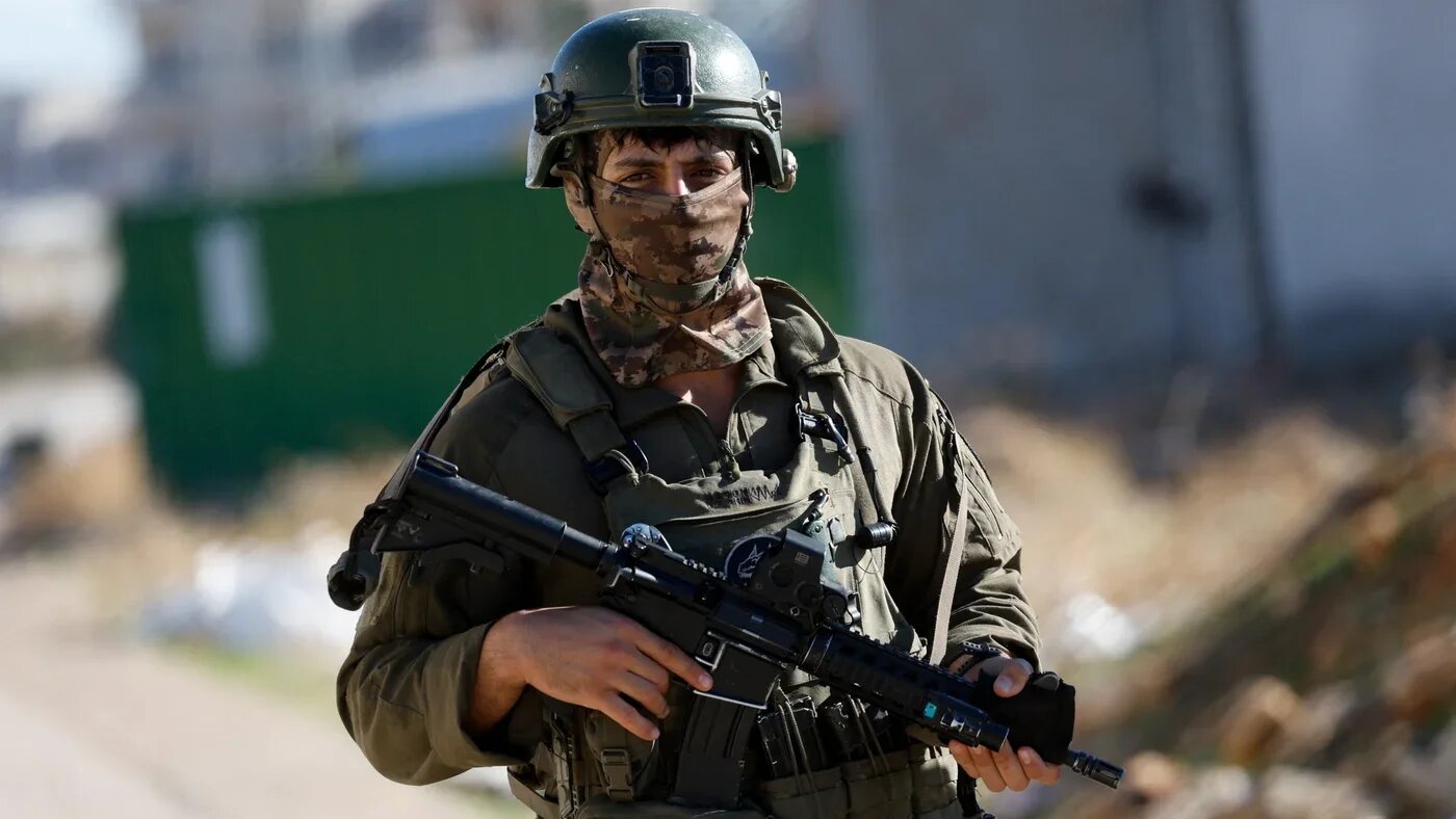 An Israeli soldier takes part in an operation in Tubas in the occupied West Bank on 26 November 2025 (Reuters/Mohamad Torokman)