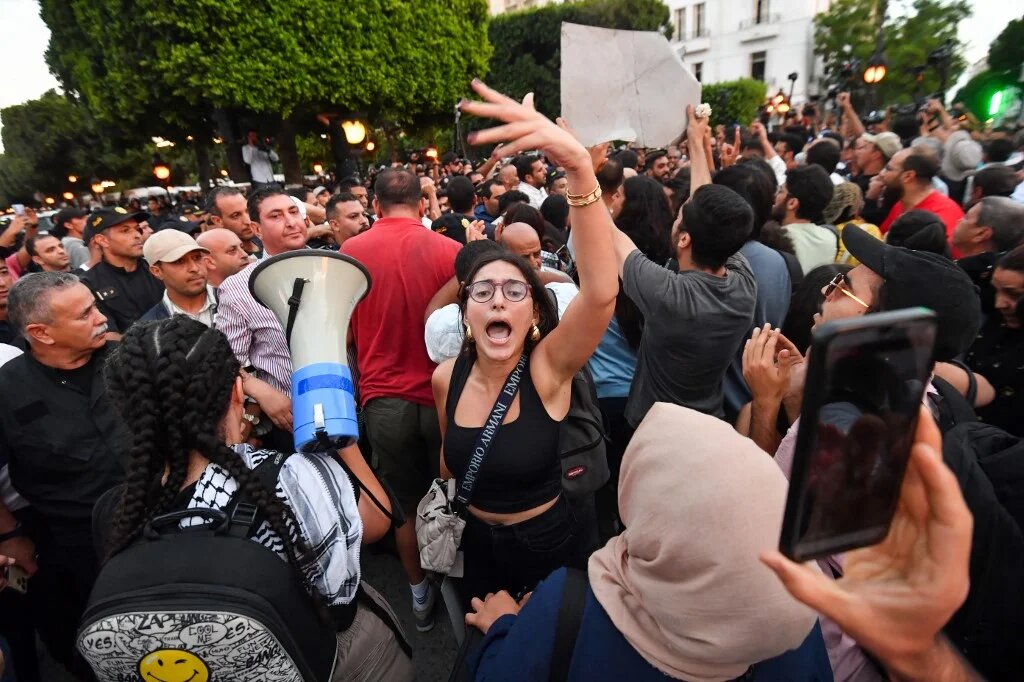 Tunisians protest against President Kais Saied during a demonstration on 4 October 2024, in Tunis (Fethi Belaid/AFP)