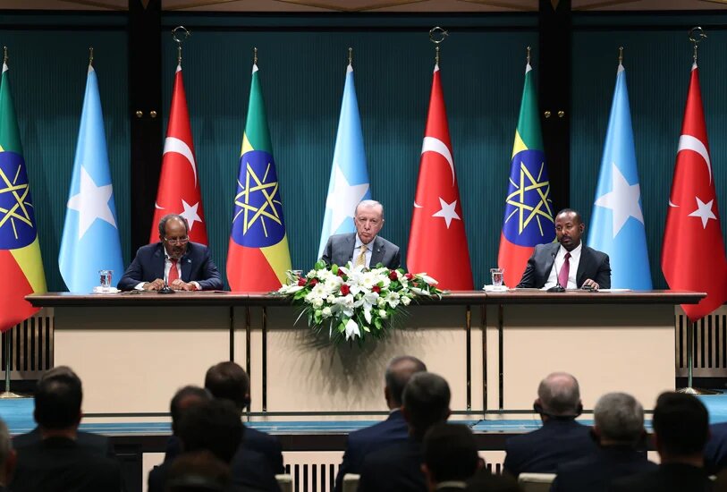 Somali President Hassan Sheikh Mohamud (left), Turkish President Recep Tayyip Erdogan (centre) and Ethiopian Prime Minister Abiy Ahmed (right) address the media during the signing of the Ankara Declaration on 11 December in Ankara (Turkish Presidency/Handout)