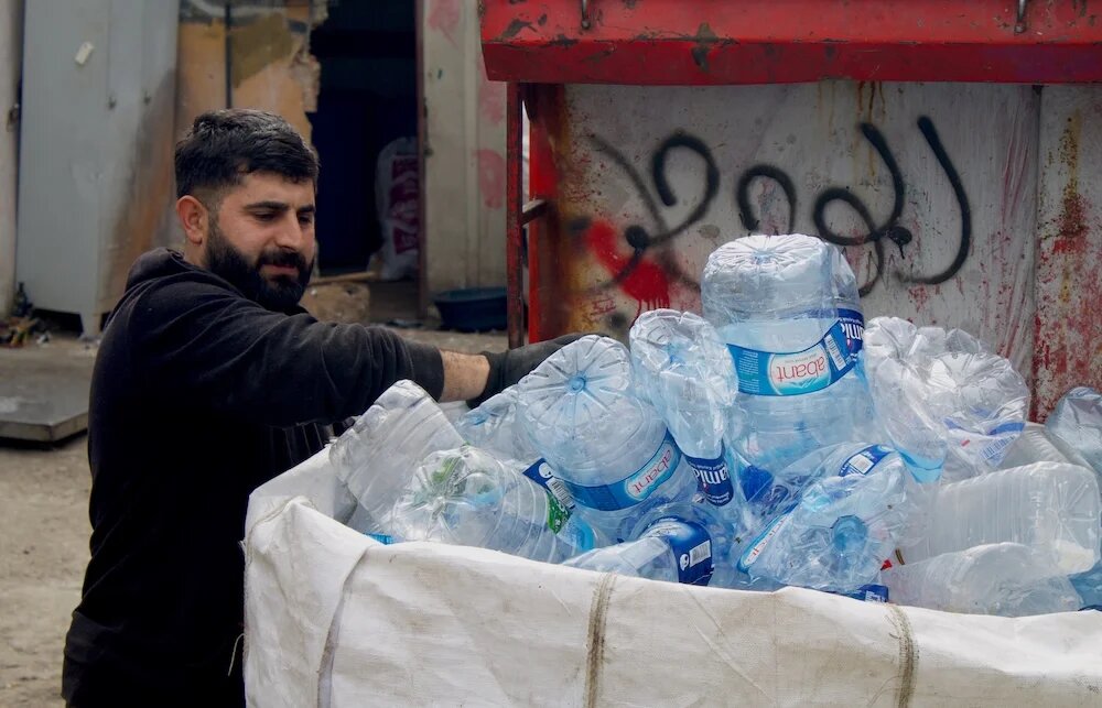 The plastic waste that Mustafa Yaşar collects will be melted into raw plastic pellets in Emir Yaşar's granule workshop in Istanbul. Both struggle to keep up with rising costs. (Naomi Cohen / MEE)