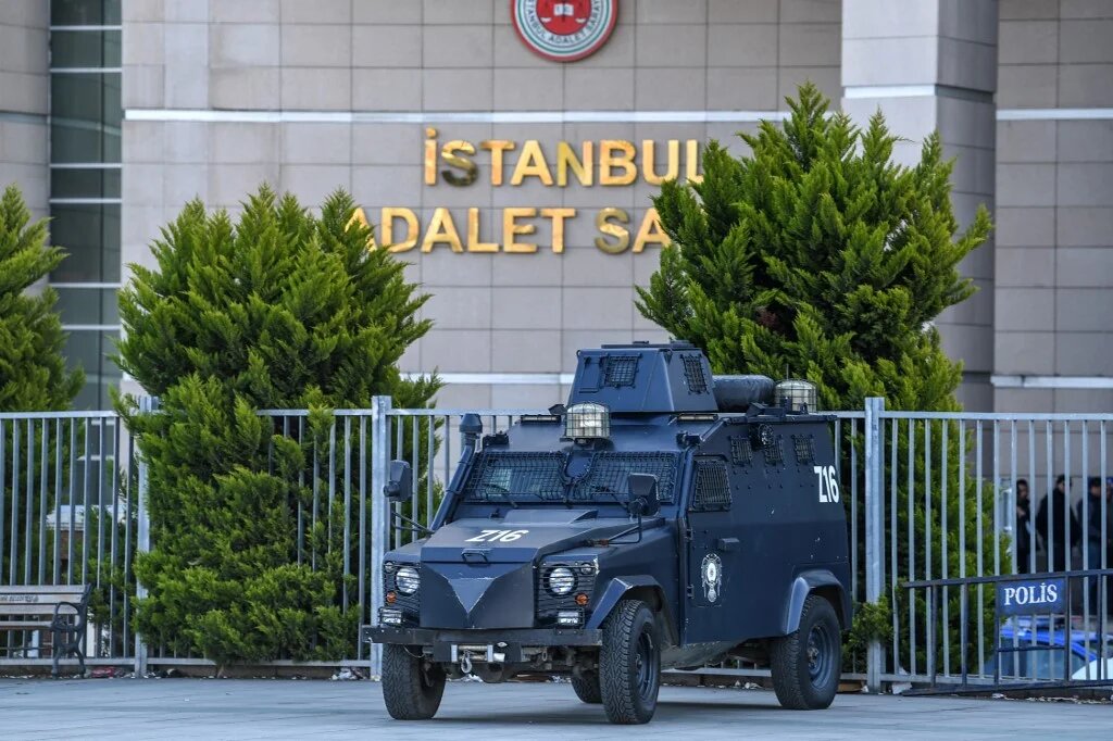 An armored Turkish police vehicle stands outside the courthouse in Istanbul on March 28, 2019,