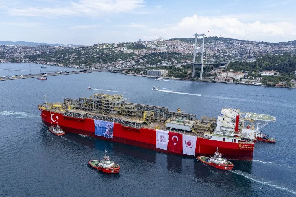 This aerial photograph shows Turkey's first floating natural gas production platform "Osman Gazi" passing through the Bosphorus, in Istanbul, on May 29, 2025. (Yasin AKGUL / AFP)