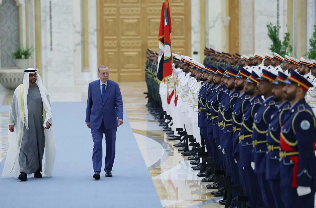 This handout image provided by the Turkish Presidency Press Office shows UAE's President Mohamed bin Zayed al-Nahyan (L) receiving Turkey's President Recep Tayyip Erdogan in Abu Dhabi on July 19, 2023. (Handout / AFP)