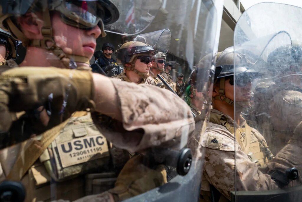 US Marines block protesters outside a federal building during an anti-Trump "No Kings Day" demonstration on 14 June 2025 in Los Angeles, California (AFP)