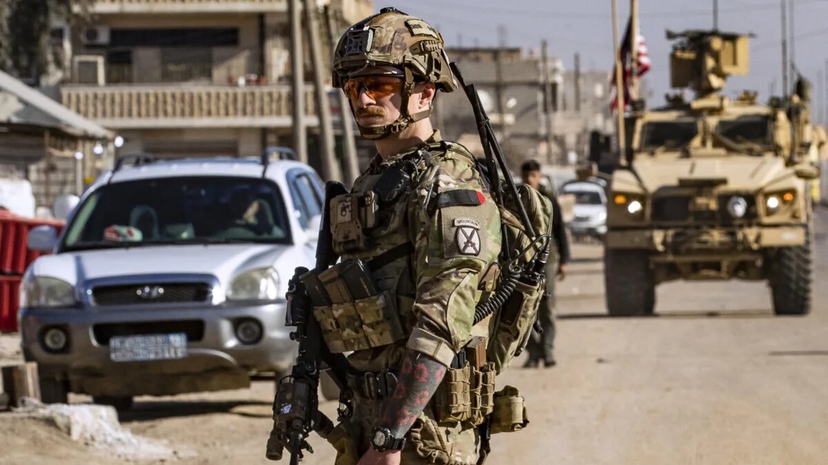 US soldiers patrol in Qamishli, in Syria's Hasakeh province, controlled mainly by Kurdish-led Syrian Democratic Forces (SDF), on 9 January 2025. (Delil Souleiman / AFP)