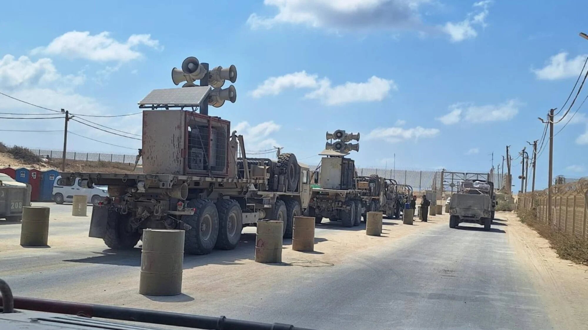 Israeli military trucks with loudspeakers preparing to enter the Gaza Strip (X)