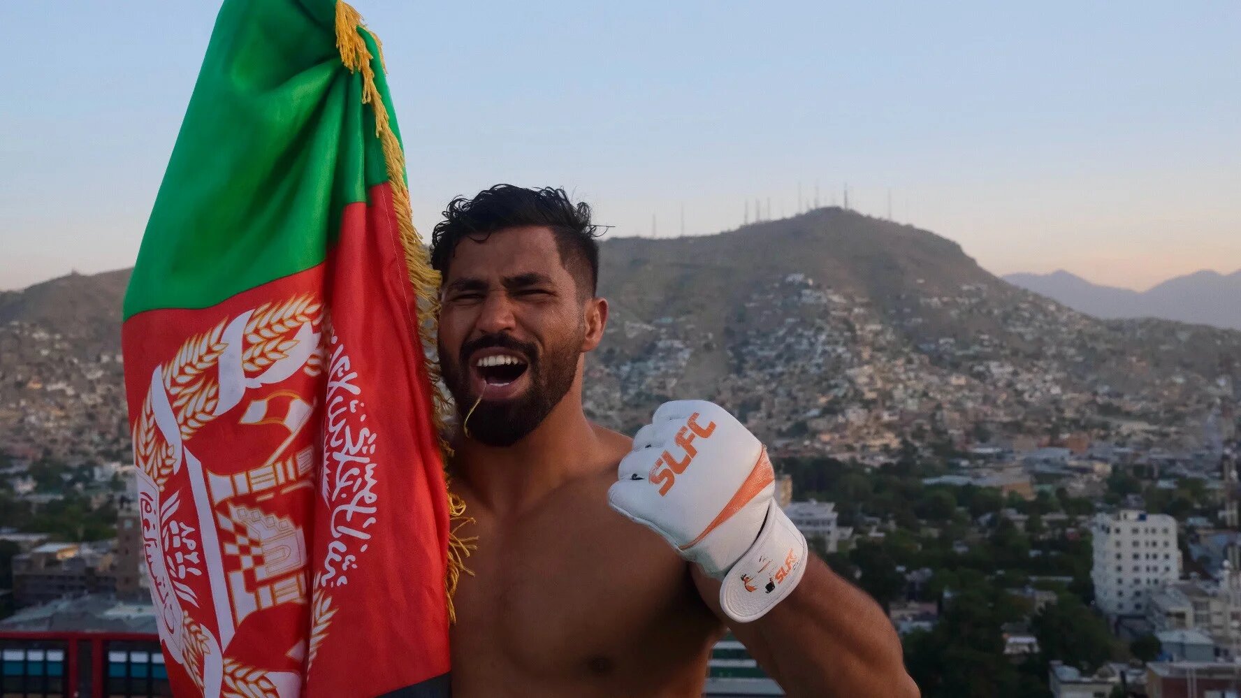 Zaki Rasooli fought professionally in Afghanistan, before fleeing the country upon the Taliban's takover of Kabul (Ali Latifi/MEE)