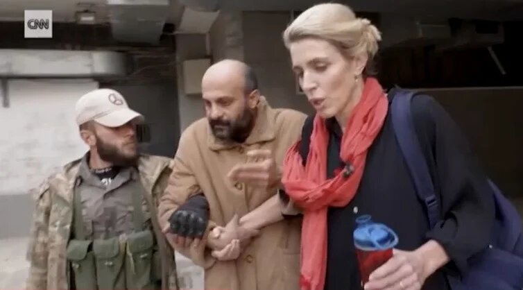 The viral moment when CNN reporter Clarissa Ward and her team stumbled upon a man locked in a cell in one of former Syrian President Bashar al-Assad's notorious jails. Image Source: Screengrab/CNN