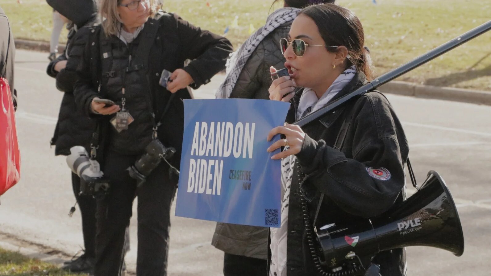 Protesters demonstrate outside a building where Biden administration officials are holding meetings in the city of Dearborn, Michigan on 8 February 2024.
