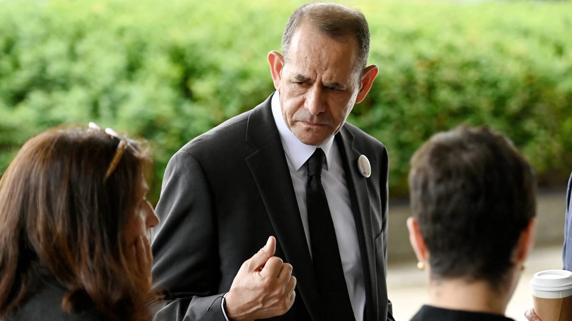 The family of Palestinian-American journalist Shireen Abu Akleh, including her brother Tony Abu Akleh (C), stands outside the State Department in Washington on 26 July 2022.