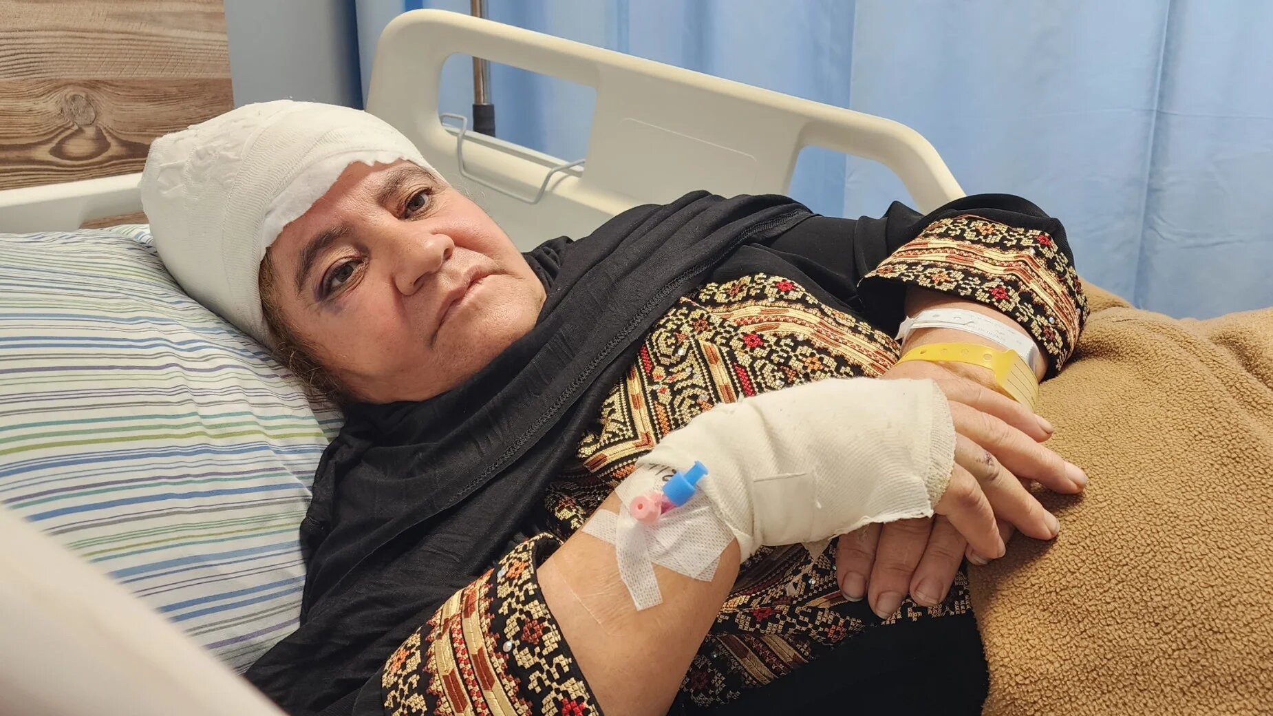 Aziza Nofal suffered repeated blows to the head that caused brain bleeding, leaving her in intensive care for two days with bruises across her body and severe blood loss (Aziza Nofal/MEE)