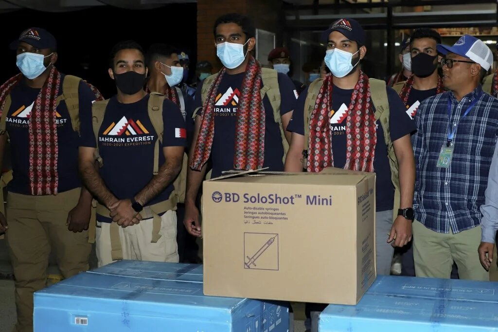 Sheikh Mohamed Hamad Mohamed Al Khalifa (second right) poses for pictures upon arriving at Tribhuvan International Airport in Kathmandu.