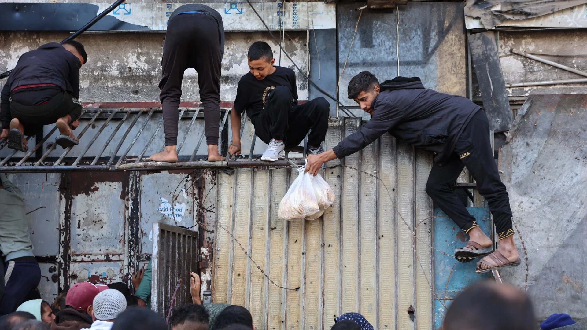 Palestinians queue outside a bakery during Eid al-Fitr, which marks the end of the holy fasting month of Ramadan, in Gaza City on 30 March 2025 (Omar al-Qattaa/AFP)