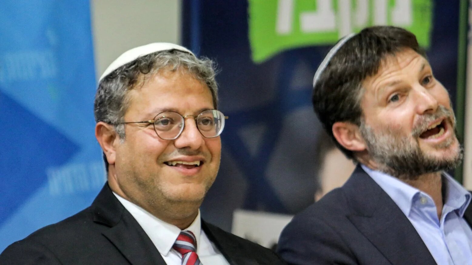 L to R) Itamar Ben-Gvir, Israeli far-right lawmaker and leader of the Otzma Yehudit (Jewish power) party, and Bezalel Smotrich, Israeli far-right lawmaker and leader of the Religious Zionist Party, attend a rally with supporters in the southern Israeli city of Sderot on October 26, 2022. GIL COHEN-MAGEN / AFP