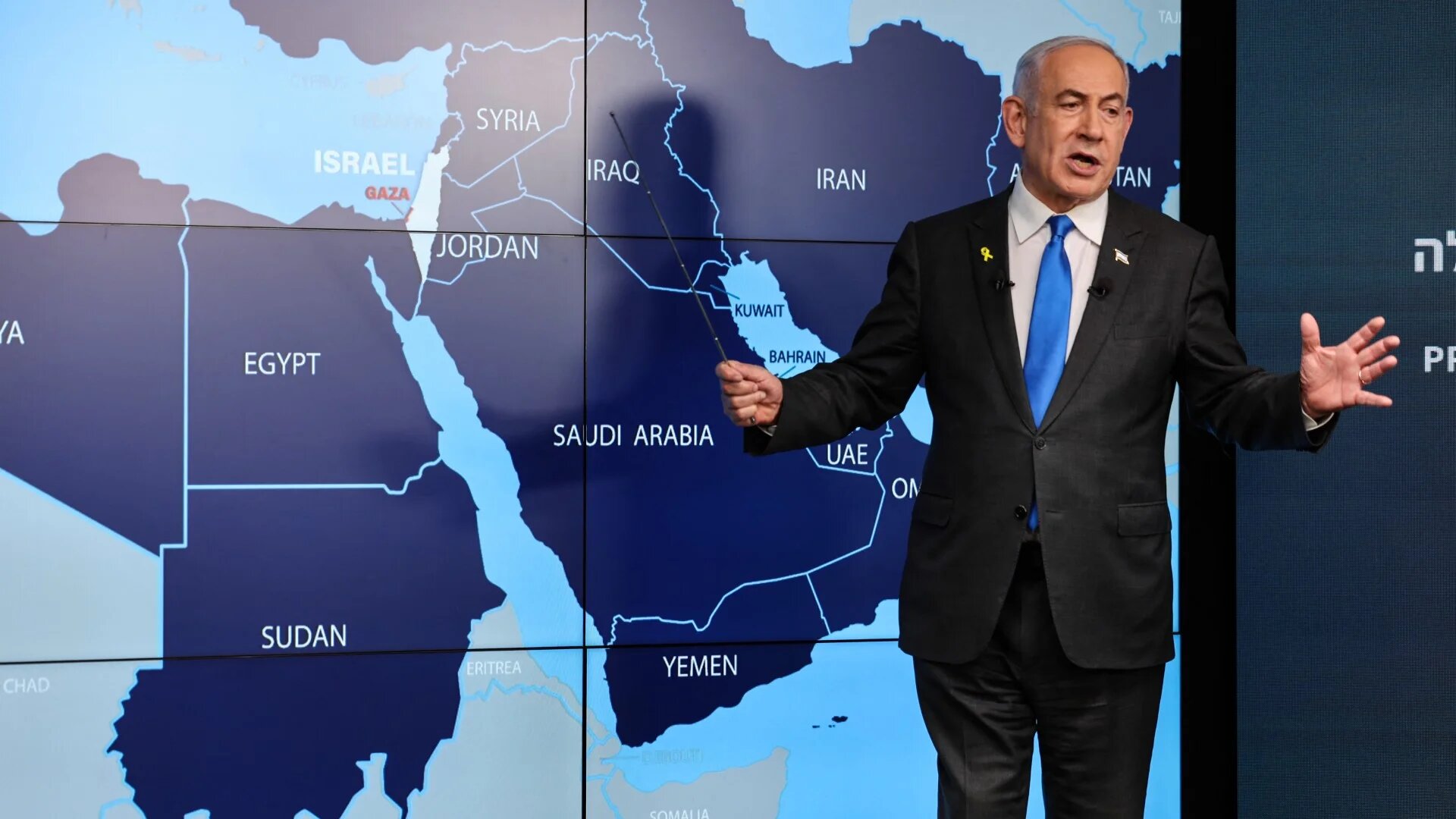 Israeli Prime Minister Benjamin Netanyahu speaks in front of a map of the Middle East at the Government Press Office (GPO) in Jerusalem on 4 September 2024 (AFP/Pool/Abir Sultan)