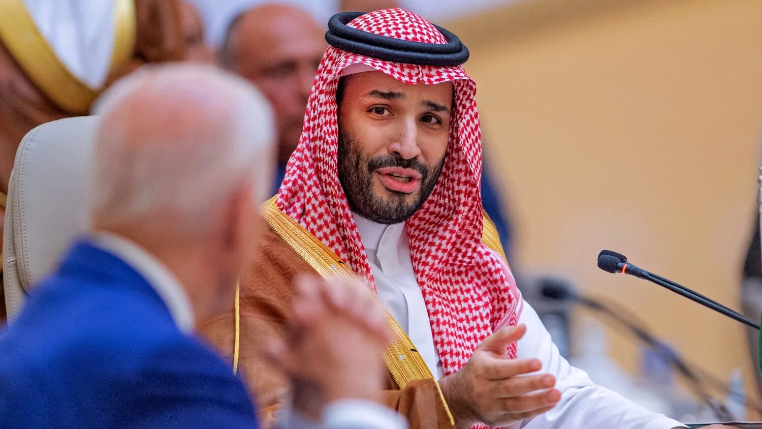 Saudi Crown Prince Mohammed bin Salman speaking to US President Joe Biden during the Jeddah Security and Development Summit in Jeddah on 16 July 2022.