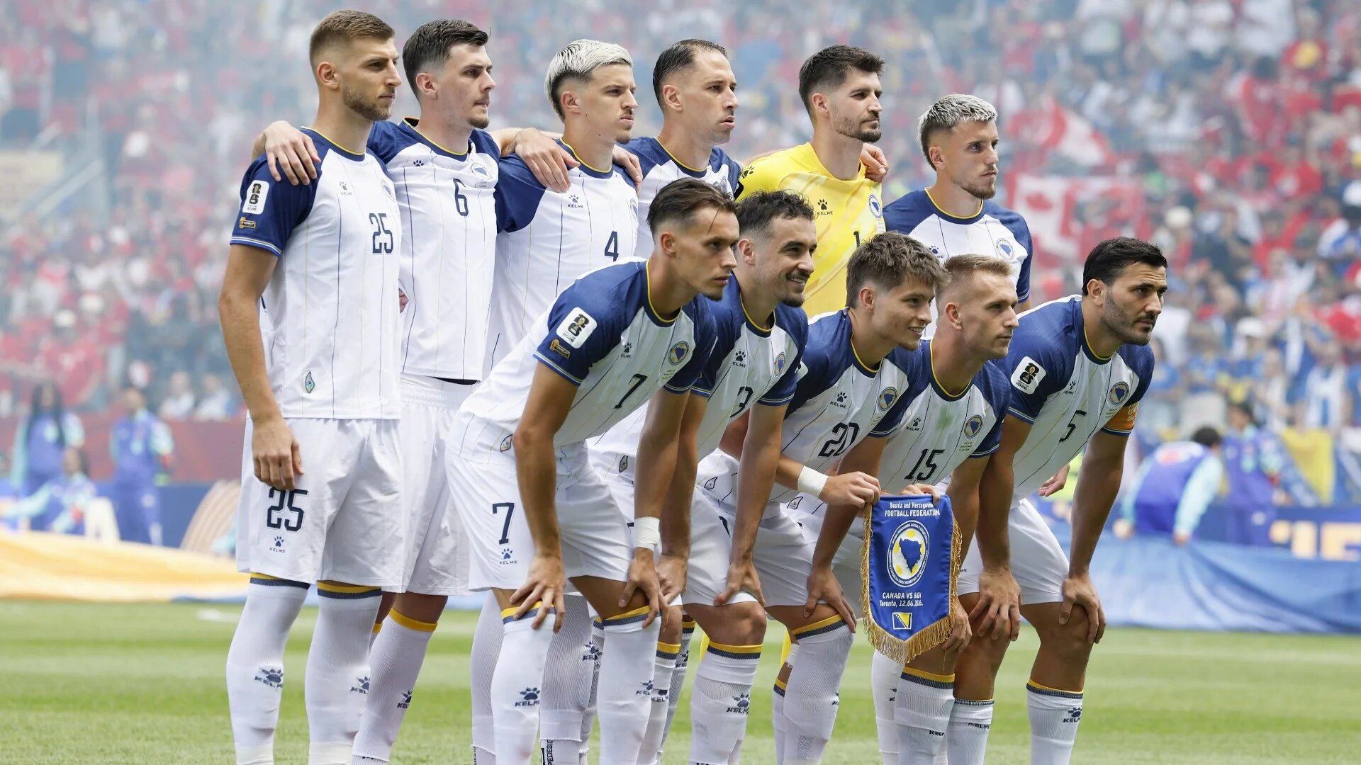 Bosnia and Herzegovina's starting 11 pose for a team photo ahead of a World Cup Group B football match against Canada at Toronto Stadium in Toronto on 12 June 2026 (Kyodo via Reuters)