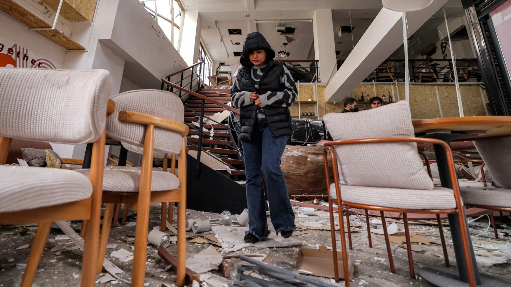 Cafe staff inspect the destruction at the premises following a US-Israeli air strike on their building earlier in the day in Tehran on 29 March 2026 (Atta Kenare/AFP)