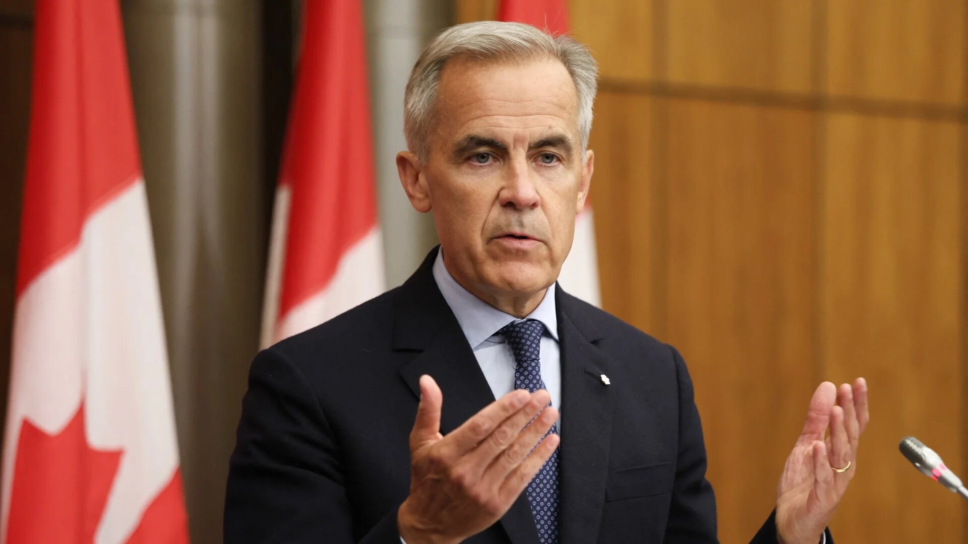 Canadian Prime Minister Mark Carney speaks to reporters at the National Press Theatre in Ottawa, Ontario, Canada on 30 July 2025 (Dave Chan/AFP)