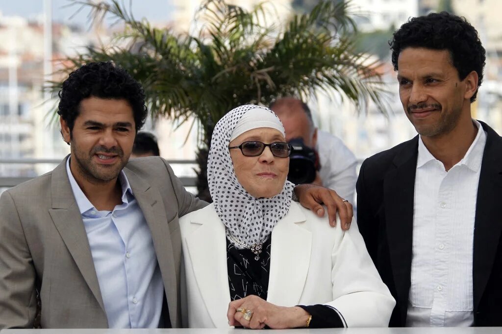 Chafia Boudraa à Cannes aux côtés de Djamel Debbouze et de Roschdy Zem, le 21 mai 2010 à Cannes, pour la présentation de Hors-la-loi (AFP/François Guillot)