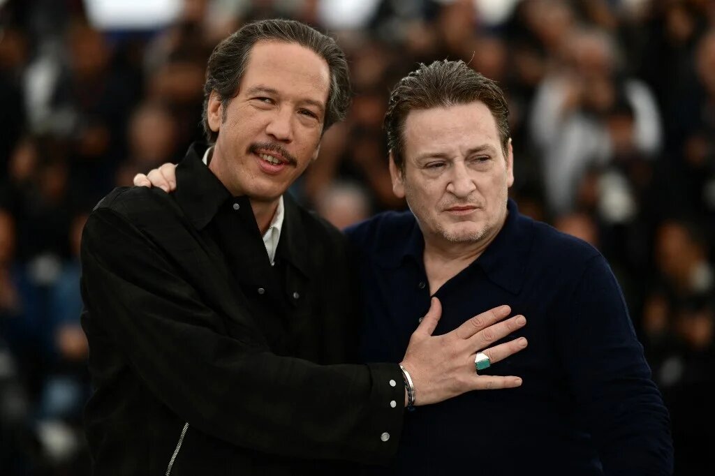 Reda Kateb et Benoît Magimel au Festival de Cannes pour présenter Omar la fraise, le 21 mai 2023 (AFP/Christophe Simon)