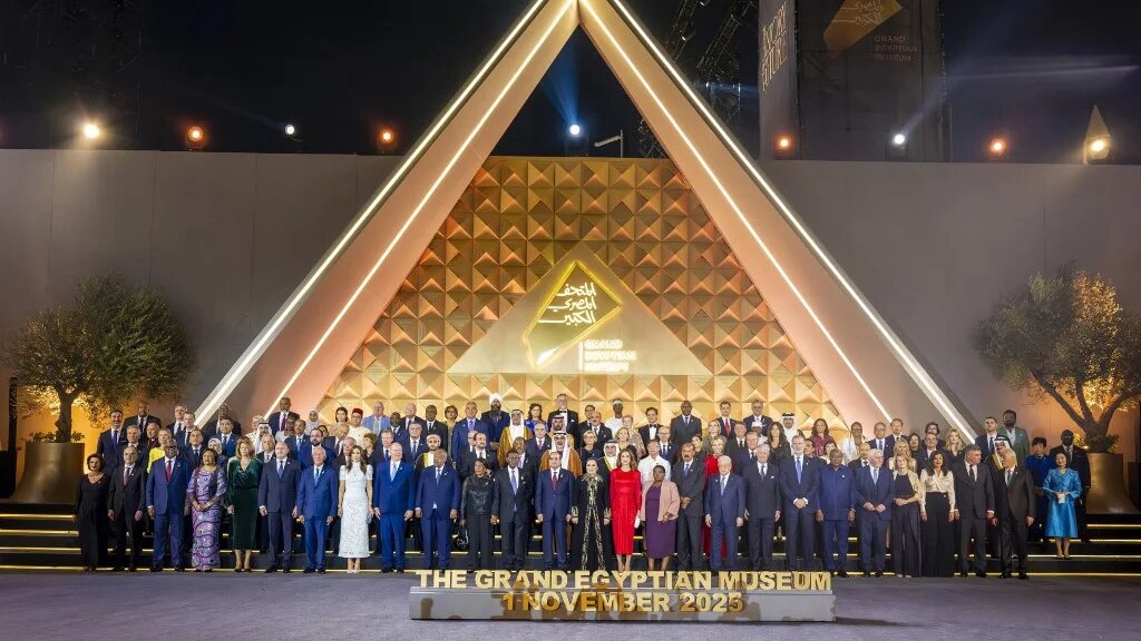 Egyptian President Abdel Fattah el-Sisi poses with officials and guests during the opening ceremony of the Grand Egyptian Museum in Giza on 1 November 2025 (Egyptian Presidency/AFP)