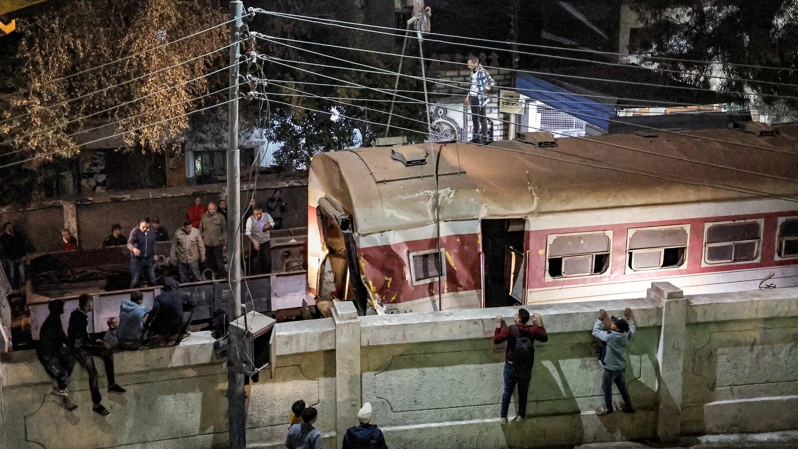 A derailed train at the scene of a railroad accident in the city of Qalyub in Qalyub province, in Egypt's Nile delta region north of Cairo on 7 March 2023 (AFP)