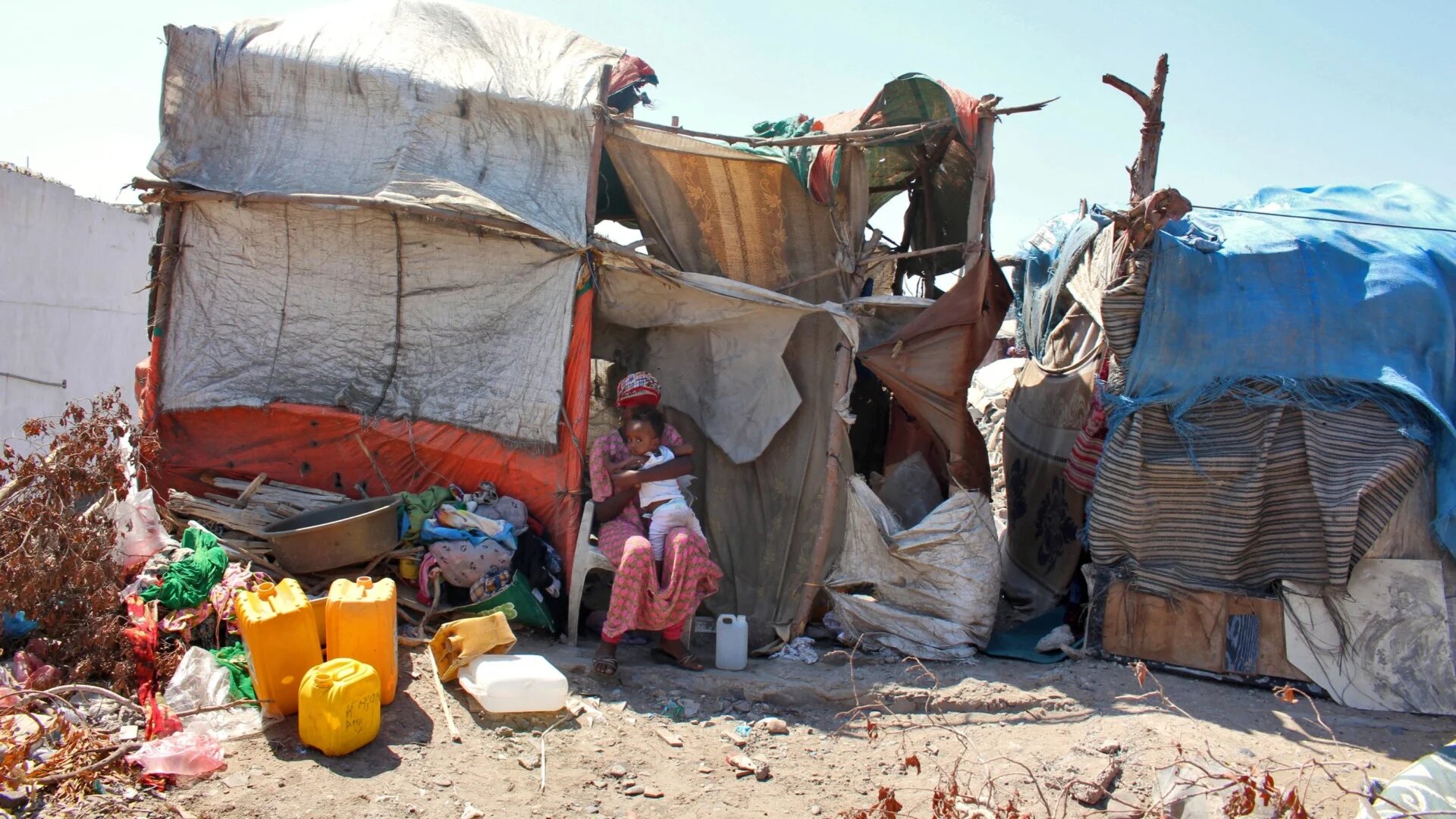 Ethiopian refugees are pictured at a camp for migrants of African origin in the Khor Maksar district of Yemen's second city of Aden on March 3, 2022. (AFP)