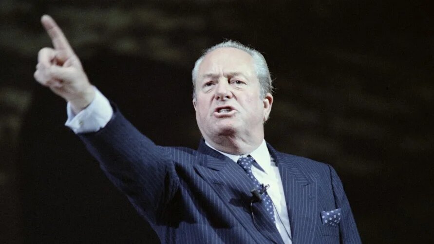 Jean-Marie Le Pen, founder of the French far-right National Front, gestures during a political meeting in Paris on 2 June 1988 (Pierre Verdy/AFP)