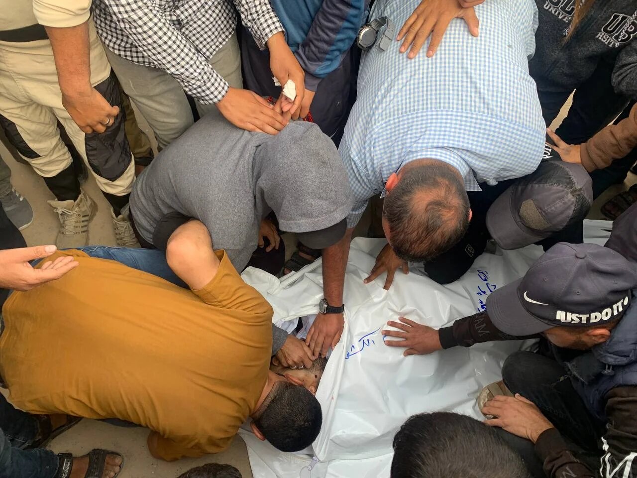 Funeral procession for nine killed in Israeli strikes on tents sheltering displaced people shelling of displaced Palestinians west of Khan Younis, south Gaza (MEE/Ahmed Aziz)