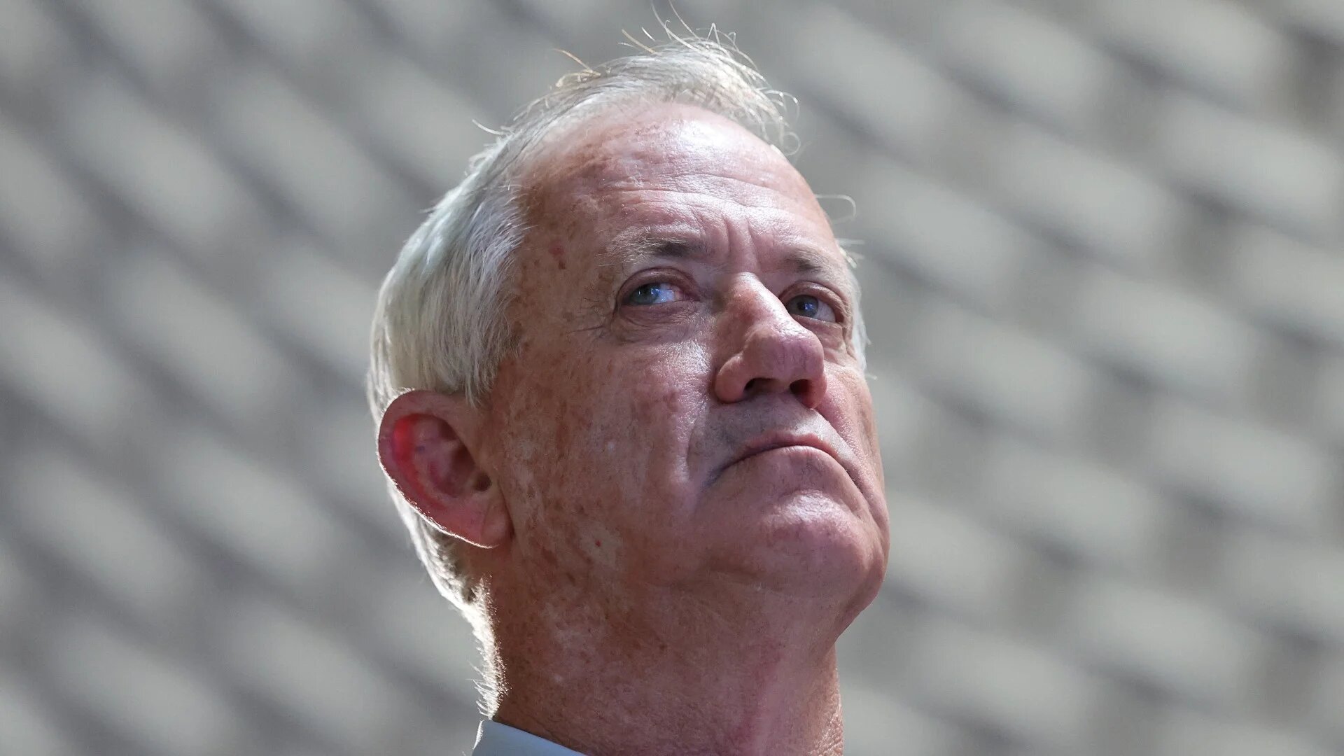 Benny Gantz attends a memorial ceremony for the 2014 Israeli war on Gaza, in Jerusalem, 16 July 2024. (Abir Sultan/Reuters)