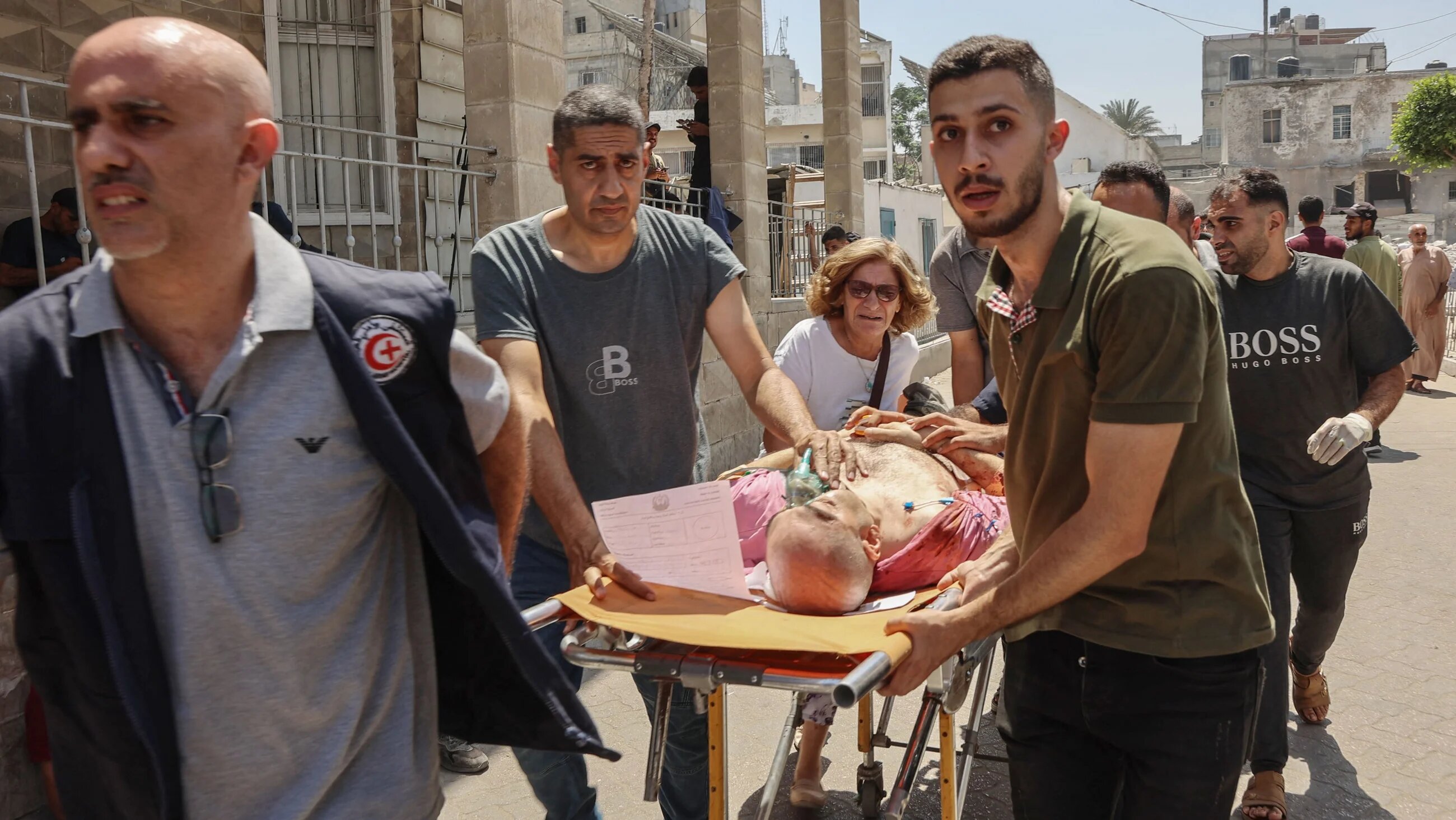 Palestinians who were injured in an Israeli strike on the only Catholic church in the besieged enclave receive treatment in Gaza City's Arab Ahli Hospital, also known as Baptist Hospital, on 17 July, 2025 (AFP/Omar al-Qattaa) 