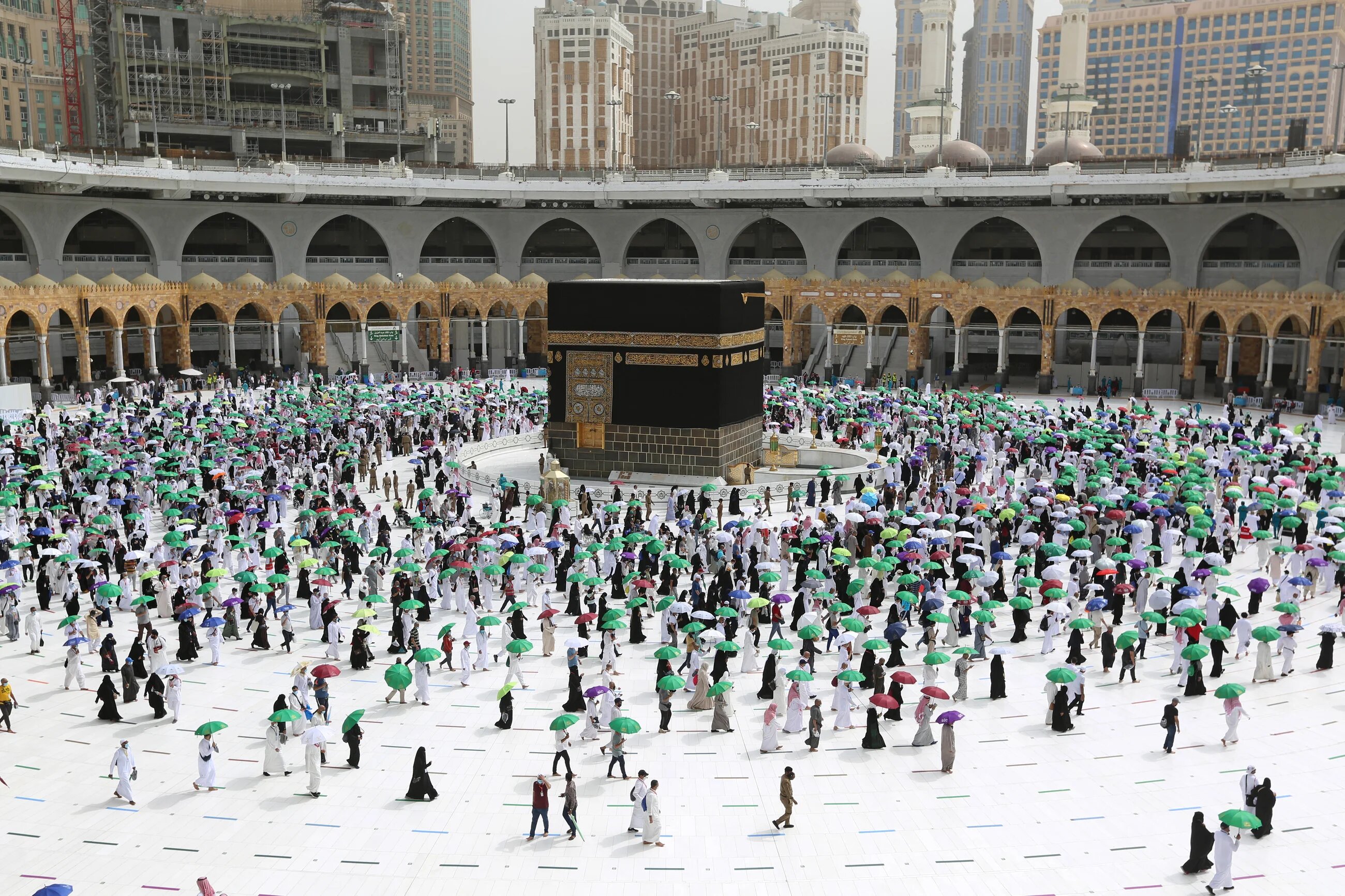 Muslim pilgrims perform the farewell tawaf (circumambulation) around the Kaaba in Mecca, marking the end of the Hajj pilgrimage on 22 July 2021 (AFP)