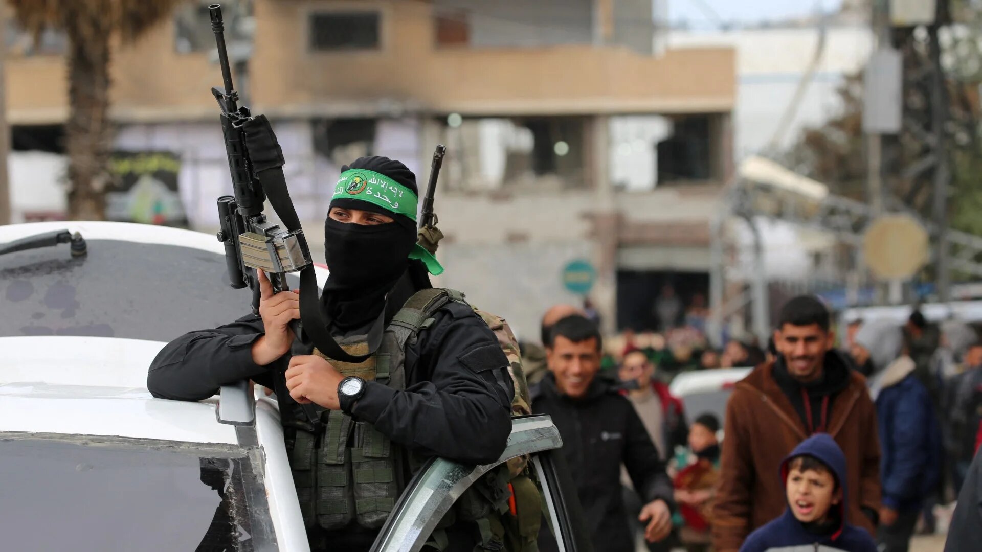 A Palestinian fighter from the armed wing of Hamas in al-Bureij refugee camp in the central Gaza Strip on 7 February 2025 (AFP/Eyad Baba)
