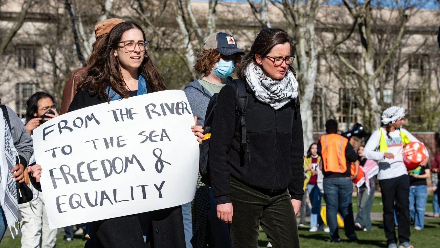 Pro-Palestinian supporters from Harvard University and the Massachusetts Institute of Technology (MIT) rally at MIT at an encampment for Palestine in Cambridge, Massachusetts on 22 April 2024.