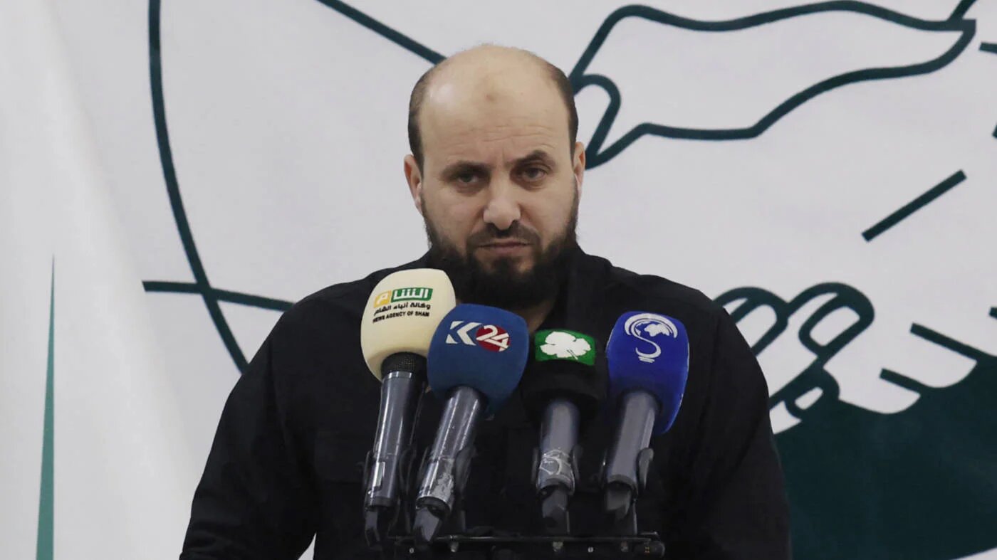 Head of Hay'at Tahrir al-Sham's 'Salvation Government' in northwest Syria Mohammed al-Bashir, holds a press conference in Idlib on 28 November 2024 (AFP/Omar Haj Kadour)