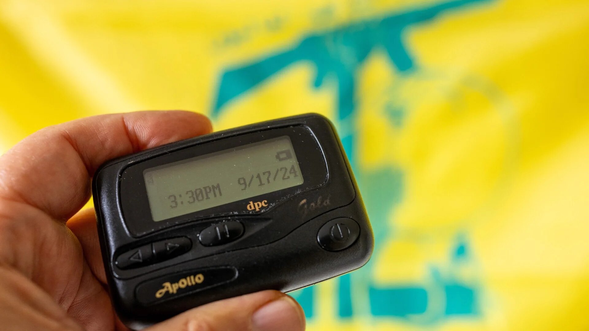 An Apollo pager with the Hezbollah flag, showing date of deadly Israeli attack (Balkis Press/ABACAPRESS.COM/Reuters)