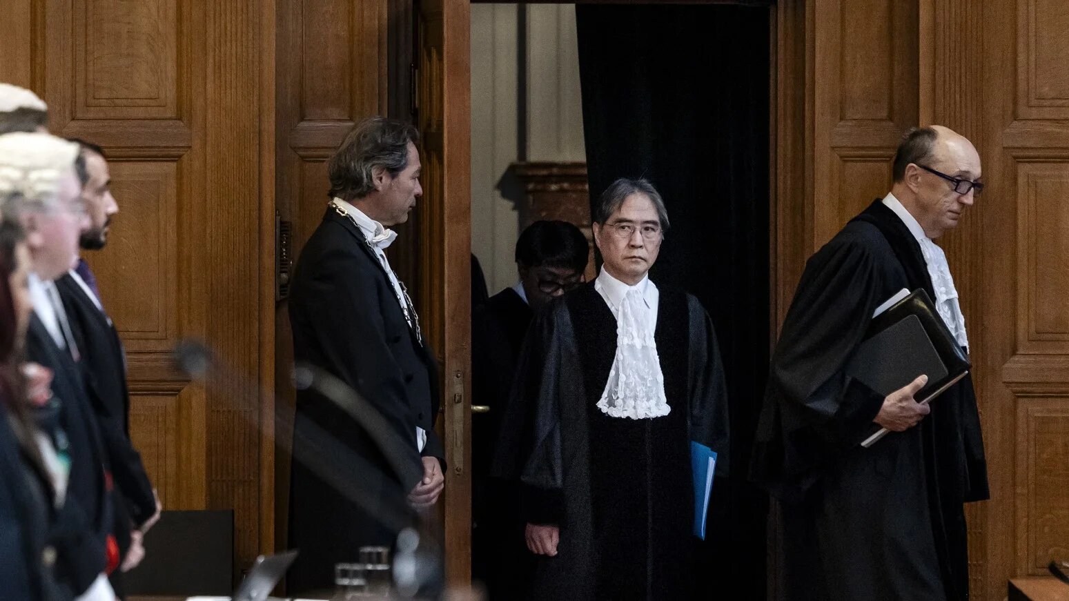 Court's president Yuji Iwasawa arrives at the start of a hearing of the International Court of Justice regarding a complaint filed by Sudan against United Arab Emirates over UAE's alleged support for the paramilitary Rapid Support Forces (RSF) that have been battling the Sudanese army since 2023, in The Hague, on April 10, 2025.