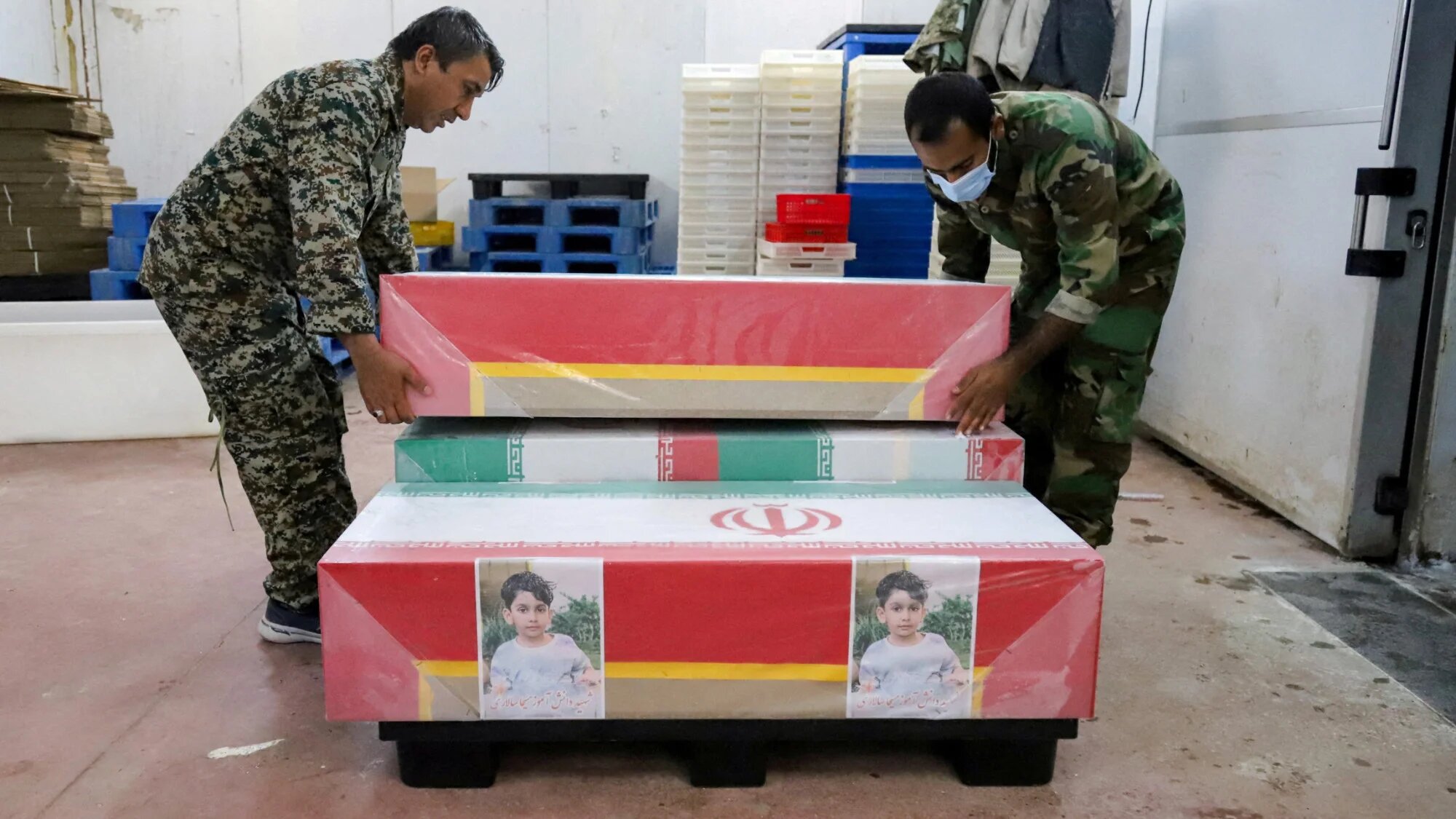 Coffins on the day of the funeral of victims of a reported strike on a school in Minab, Iran, 3 March 2026 (Amirhossein Khorgooei/ISNA/WANA/Reuters)