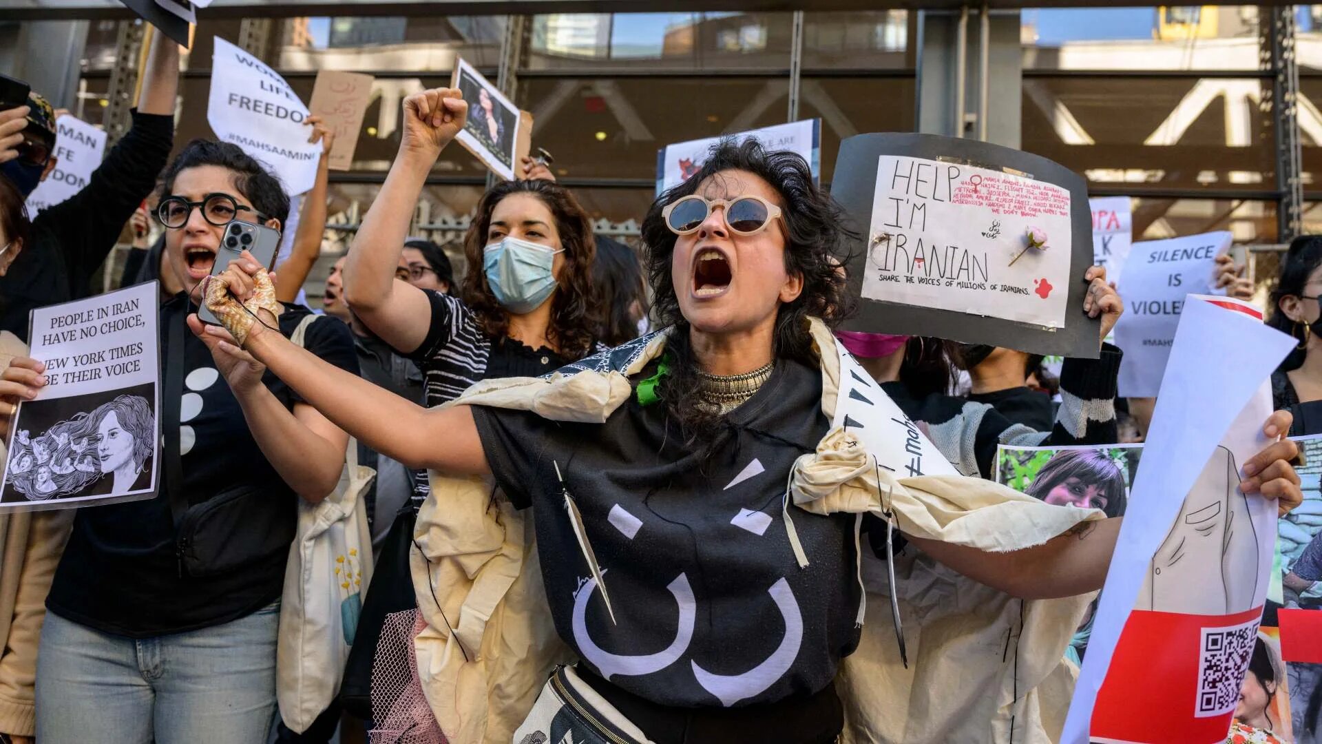 Activists demonstrate over the death of Mahsa Amini in Iran outside The New York Times building in New York City on 27 September 2022.
