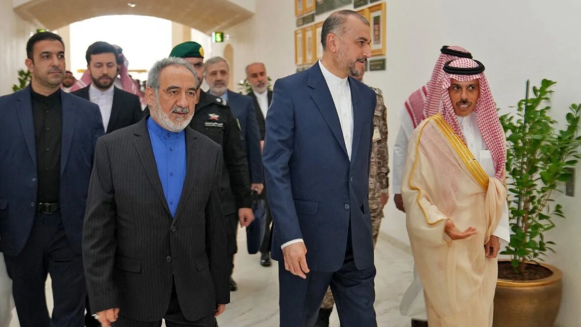 Saudi Foreign Minister Faisal bin Farhan (R) receiving his Iranian counterpart Hossein Amir-Abdollahian (C) in Riyadh on 17 August 2023 (AFP/Iranian foreign ministry handout)