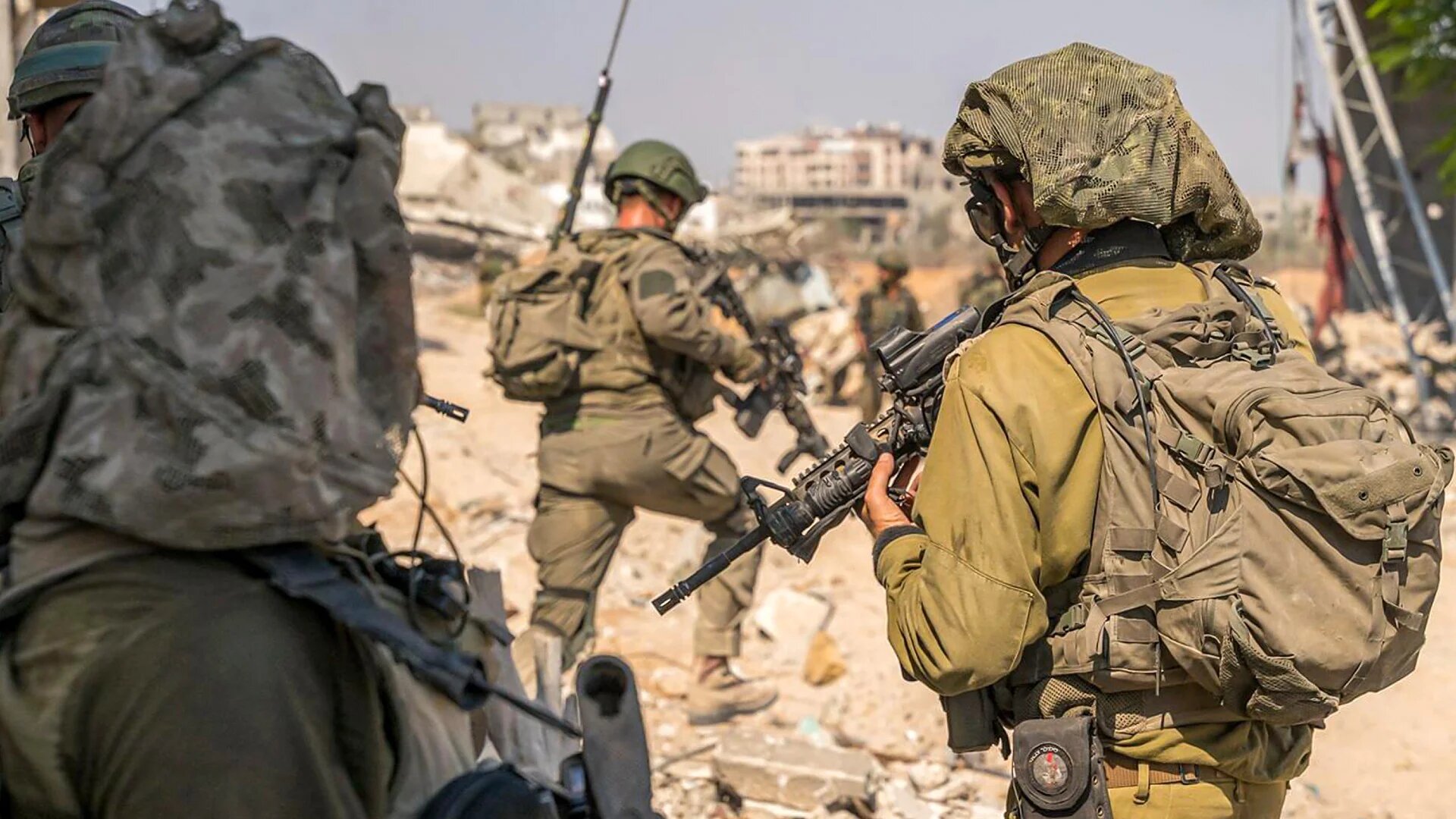 This handout picture released by the Israeli army on 30 August 2024 shows Israeli soldiers in the Gaza Strip (Israeli army/AFP)